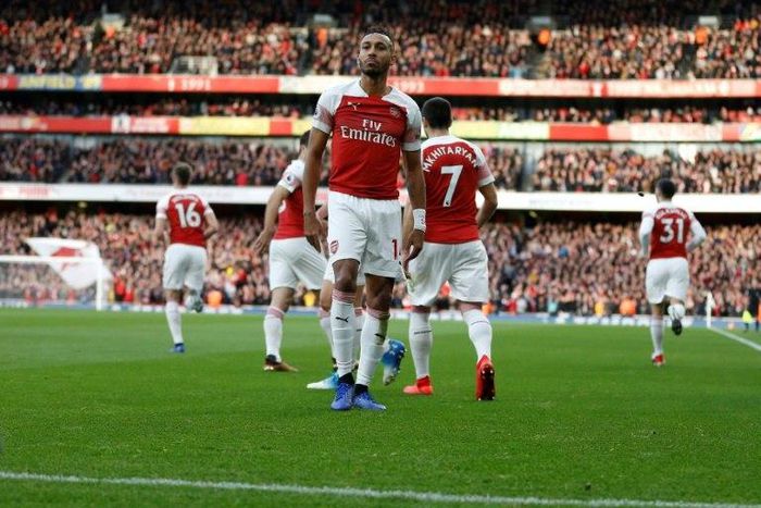 The Tottenham Hotspur fan who threw a banana skin onto the pitch during the match with Arsenal has been charged with throwing a missile and not a racially aggravated offence