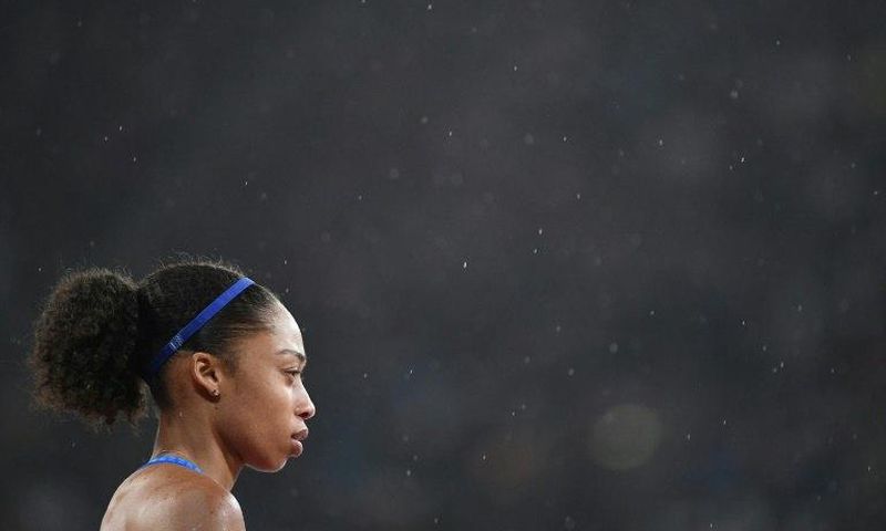 US athlete Allyson Felix reacts after finishing third in the final of the women's 400m athletics event at the 2017 IAAF World Championships at the London Stadium in London on August 9, 2017
