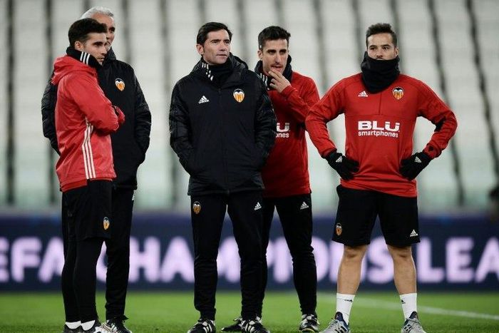 "All or nothing," said Valencia's Spanish coach Marcelino Garcia Toral (C) of their match against Juventus.