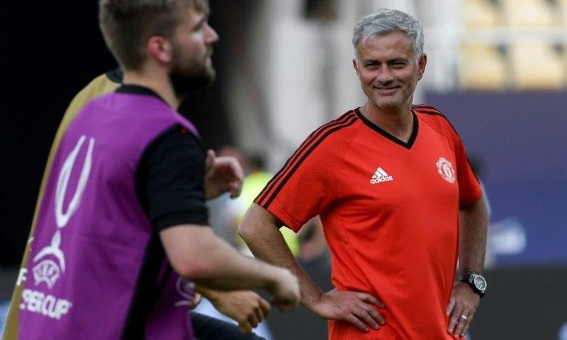 Manchester United's manager Jose Mourinho (R) looks on during training session in Skopje on August 7, 2017