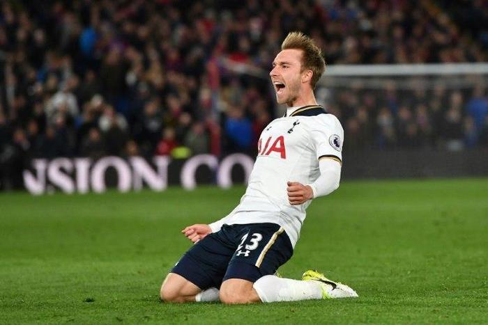 Tottenham Hotspur's midfielder Christian Eriksen celebrates scoring the opening goal during the English Premier League football match against Tottenham Hotspur April 26, 2017