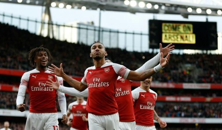 Pierre-Emerick Aubameyang celebrates after scoring the opening goal for Arsenal against Tottenham