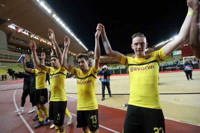 Borussia Dortmund celebrate Tuesday's 2-0 win at Monaco, which confirmed their Champions League, last 16 place as group winners, but coach Lucien Favre is expected to make numerous changes on Saturday for the Bundesliga leaders against Werder Bremen.