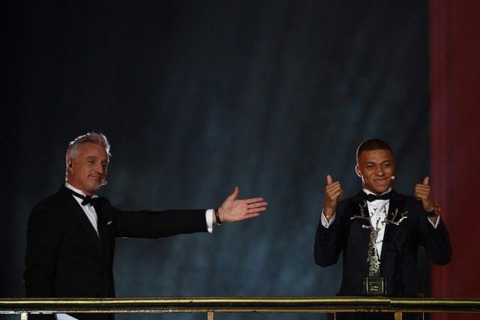 Kylian Mbappe gives the thumbs up after being named as the winner of the Kopa Trophy