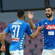 Napoli's Spanish defender Raul Albiol (c) celebrates his first goal this season.