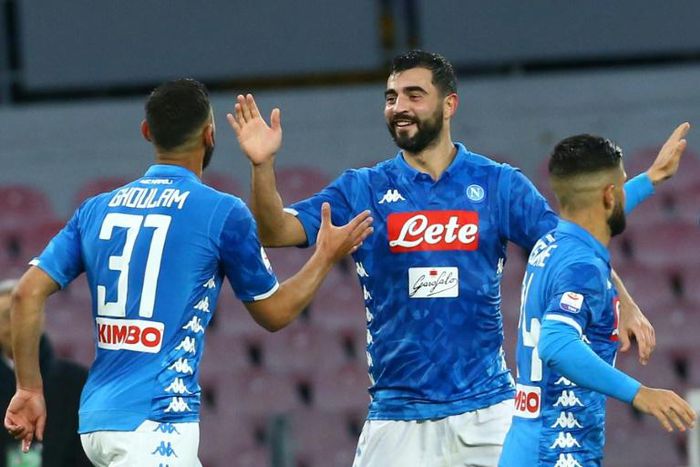 Napoli's Spanish defender Raul Albiol (c) celebrates his first goal this season.
