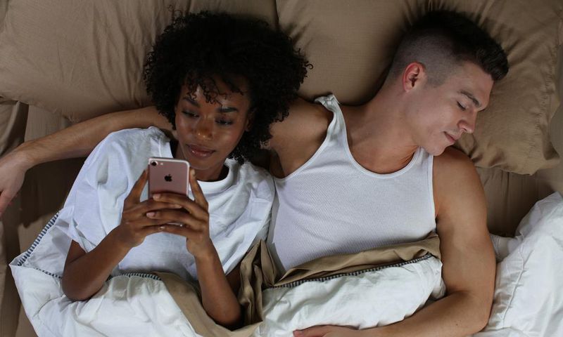 Imagine your partner reaching out to the other person for more trysts behind your back [Credit: Bustle]