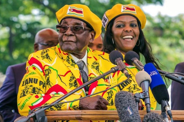 Robert Mugabe and his wife Grace, pictured at a rally on November 8 2017 -- one of their last appearances before his fall from power