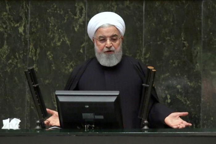 Iran's President Hassan Rouhani speaks at parliament in the capital Tehran on December 25, 2018 as he presents his government's 2019-2020 budget