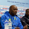 Mamelodi Sundowns coach Pitso Mosimane (L) was angry after his substituted players were accused of wasting time in a South African Premiership match Sunday