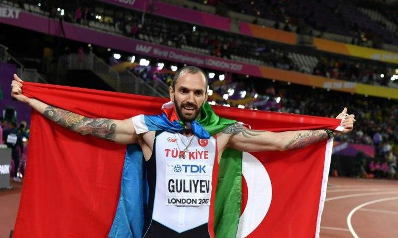 Turkey's Ramil Guliyev celebrates after winning the 200-metres at the world athletics championships in London