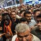 French forward Bafetimbi Gomis (C) is greeted by fans as he arrives at the Ataturk International airport on June 28, 2017 in Istanbul