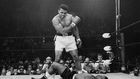 Muhammad Ali stands over fallen challenger Sonny Liston, shouting and gesturing shortly after dropping Liston with a short hard right to the jaw on May 25, 1965, in Lewiston, Maine. The bout lasted only one minute into the first round.JOHN ROONEY / AP