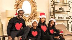 Kevin Hart and family in Christmas themed photo