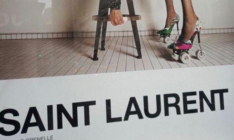 Yves Saint Laurent have been accused of 'degrading' models and 'inciting rape' with a new French advertising campaign. One image (above) shows a model in a leotard and roller skate stilettos bending over a stool
