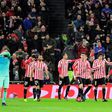Athletic Bilbao's players celebrate after Athletic Bilbao's forward Aritz Aduriz scored his team's first goal during the Spanish Copa del Rey round of 16 first leg match against FC Barcelona at the San Mames stadium in Bilbao on January 5, 2017