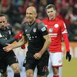 Bayern Munich's midfielder Arjen Robben celebrates scoring the 2-1 goal with Bayern Munich's midfielder Franck Ribery (L) during the German first division Bundesliga football match between FSV Mainz 05 and FC Bayern Munich December 2, 2016