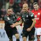 Bayern Munich's midfielder Arjen Robben celebrates scoring the 2-1 goal with Bayern Munich's midfielder Franck Ribery (L) during the German first division Bundesliga football match between FSV Mainz 05 and FC Bayern Munich December 2, 2016