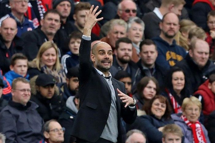 Manchester City's Pep Guardiola gestures on the touchline during their English FA cup quarter final match against Middlesbrough on March 11, 2017