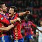 CSKA Moscow's Alan Dzagoev (R) celebrates with teammate Zoran Tosic after scoring a goal during an UEFA Champions League match, in December 2016