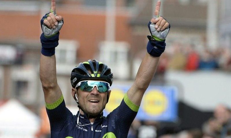 Alejandro Valverde celebrates as he crosses the finish line to win the 102nd edition of the Liege-Bastogne-Liege cycling race on April 23, 2017