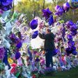 A fan visits a memorial outside Paisley Park, the home and studio of Prince, in April, 2016 in Chanhassen, Minnesota