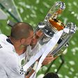 Real Madrid's Pepe lifts the Champions League trophy in Milan on May 28, 2016
