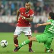 Bayern Munich's midfielder Arturo Vidal (L) and Moenchengladbach's defender Julian Korb vie for the ball during the German first division Bundesliga football match between FC Bayern Munich and Borussia Moenchengladbach on October 22, 2016