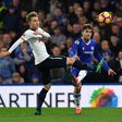 Tottenham Hotspur's midfielder Christian Eriksen (L) vies with Chelsea's defender Marcos Alonso (R) during the English Premier League football match November 26, 2016