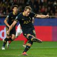 Tottenham Hotspur's striker Harry Kane kicks the ball against Monaco on November 22, 2016
