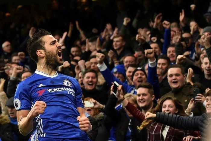 Chelsea's Cesc Fabregas celebrates scoring the opening goal against Swansea