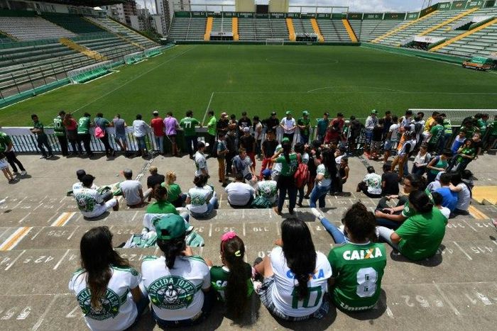 Fans pay tribute to the Brazilian football team Chapecoense Real, which was decimated by a plane crash that killed 19 of its players and 24 other club members on November 28, 2016