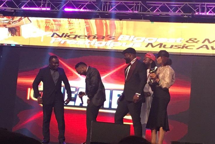 Kcee, Harysong on stage at the Headies 2016.