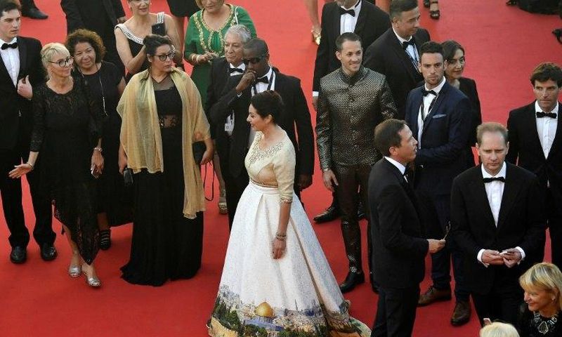 Israeli Culture Minister Miri Regev at the Cannes film festival's opening ceremony, wearing a dress featuring the Old City of Jerusalem
