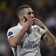Real Madrid's forward Karim Benzema celebrates a goal during the UEFA Champions League football match Real Madrid CF vs Borussia Dortmund at the Santiago Bernabeu stadium in Madrid on December 7, 2016