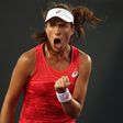 Johanna Konta of Great Britain celebrates withdraws from the WTA Charleston event due to injury