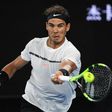 Spain's Rafael Nadal hits a return against Switzerland's Roger Federer during the men's singles final of the Australian Open in Melbourne on January 29, 2017