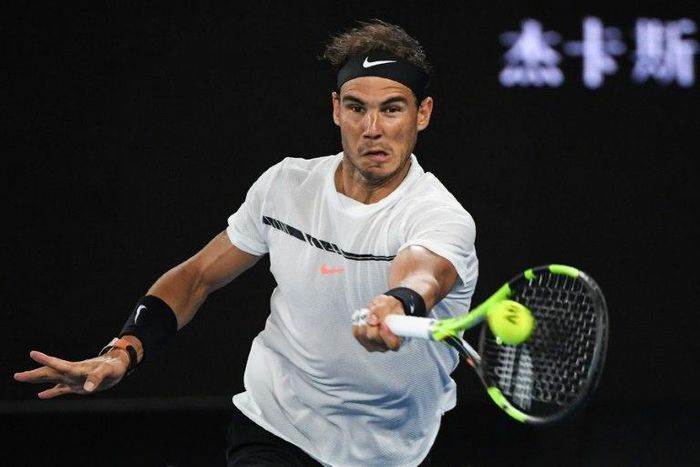 Spain's Rafael Nadal hits a return against Switzerland's Roger Federer during the men's singles final of the Australian Open in Melbourne on January 29, 2017