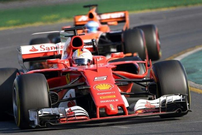 Ferrari's Sebastian Vettel (front) drives to a surprise 10 second win at the Melbourne Grand Prix