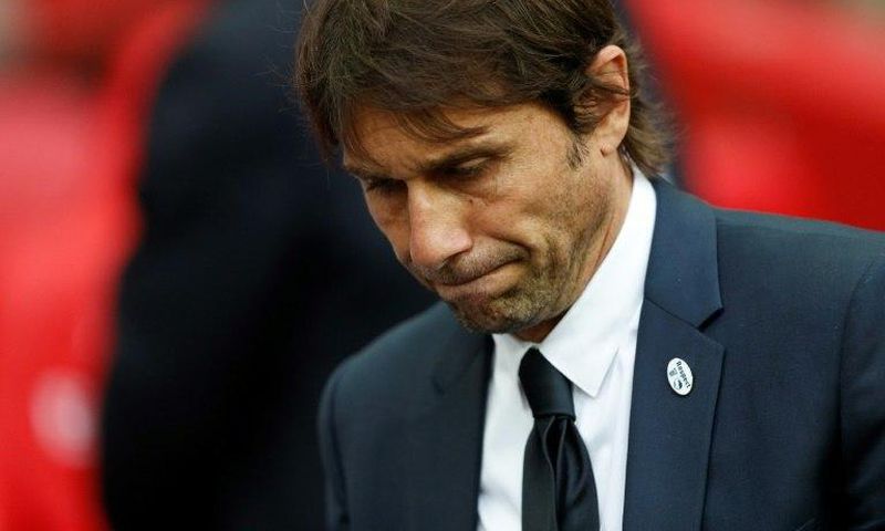 Chelsea's Italian head coach Antonio Conte reacts on the pitch after their defeat to Arsenal after the English FA Cup final football match between Arsenal and Chelsea on May 27, 2017