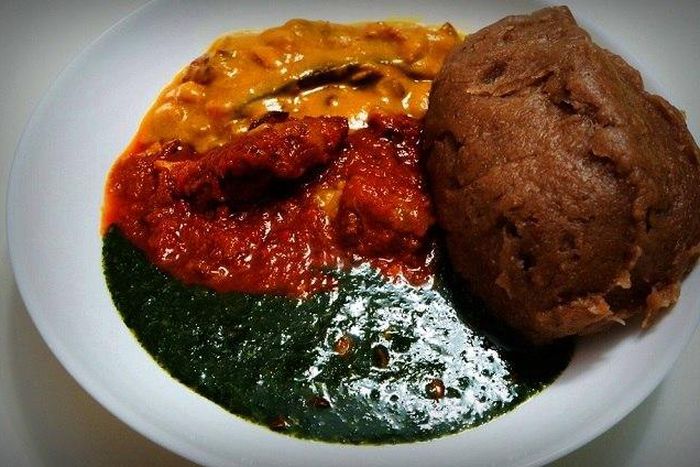 A plate of amala and ewedu soup