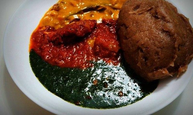 A plate of amala and ewedu soup