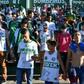 People pay tribute to the players of Brazilian team Chapecoense Real who were killed in a plane accident in the Colombian mountains, at the club's Arena Conda stadium in Chapeco, in the southern Brazilian state of Santa Catarina, on November 29, 2016