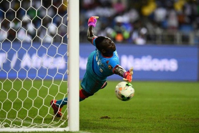 Burkina Faso's goalkeeper Herve Kouakou Koffi stops the ball during the penalty shootout of the 2017 Africa Cup of Nations semi-final football match against Egypt at the Stade de l'Amitie Sino-Gabonaise in Libreville on February 1, 2017