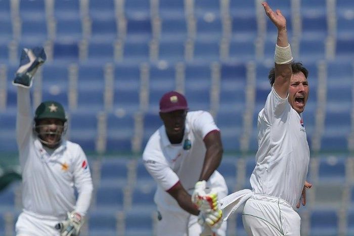 Pakistan spinner Yasir Shah (right) successfully appeals for leg before wicket against West Indies captain Jason Holder on the final day of the second Test in Abu Dhabi on October 25, 2016