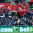 Manchester United's striker Zlatan Ibrahimovic (R) celebrates scoring his team's second goal on November 6, 2016