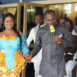 Obaapa Christy being led to her car by Prophet Badu Kobi