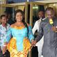 Obaapa Christy being led to her car by Prophet Badu Kobi