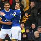 Everton's striker Dominic Calvert-Lewin (L) celebrates with midfielder Ross Barkley after scoring the opening goal of the English Premier League football match against Hull City March 18, 2017