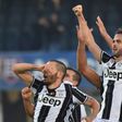 Juventus midfielder Miralem Pjanic (R) celebrates with teammates on November 6, 2016